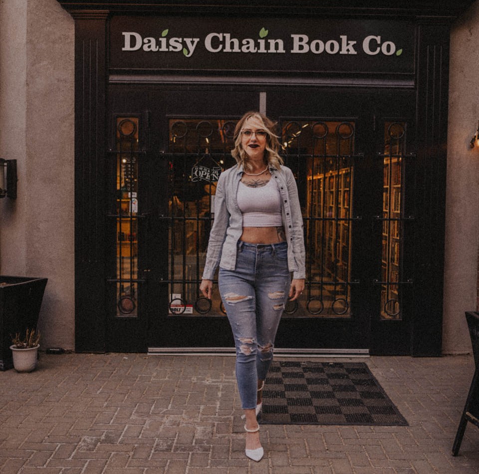 Kylie Doyle outside Daisy Chain Book Co.